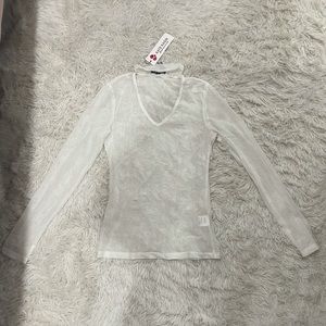 Sheer long sleeved top with collar